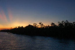 Coucher de soleil depuis un bateau l'Amazone Voyage Photo au Brésil